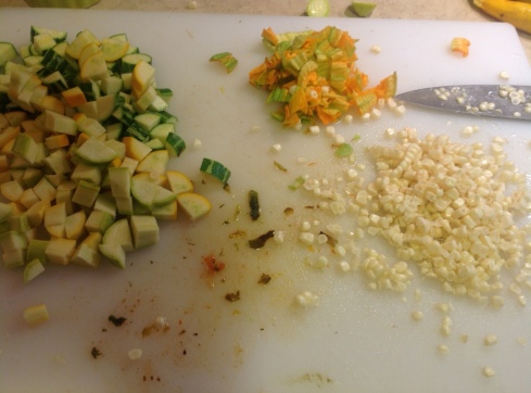 Chop chop. I knifed down a cob of corn and diced some zucchini and yellow squash.